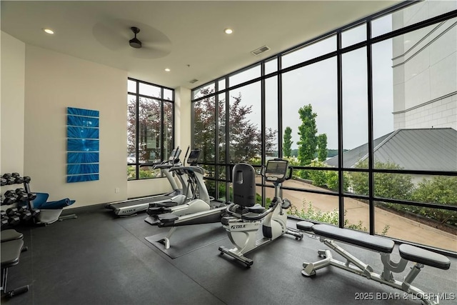 166 Captiva Dr Unit 5D, Sunrise Beach, MO 65079 - gym with a wall of windows, a ceiling fan, and recessed lighting