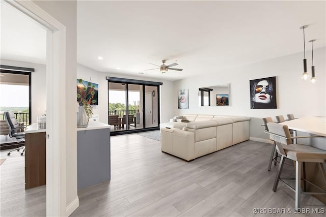 166 Captiva Dr Unit 5D, Sunrise Beach, MO 65079 - living area featuring light wood-style flooring, ceiling fan, recessed lighting, and an office area
