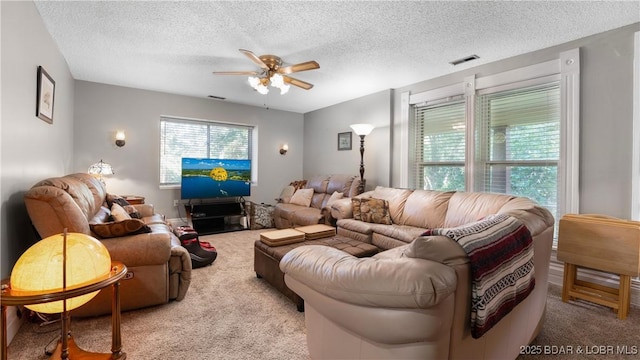 87 Outback Loop, Linn Creek, MO 65052 - living area with carpet flooring, a ceiling fan, and a textured ceiling