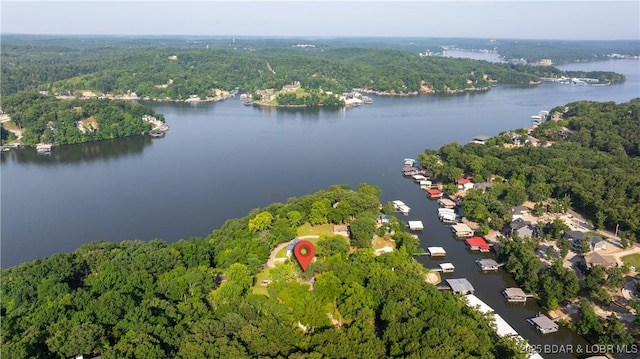 87 Outback Loop, Linn Creek, MO 65052 - aerial view of property's location featuring a heavily wooded area and a large body of water