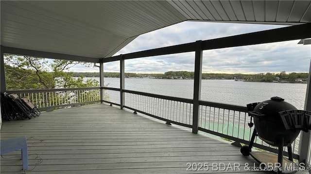 28136 Lyndsey Ln, Rocky Mount, MO 65072 - wooden deck with area for grilling and a water view