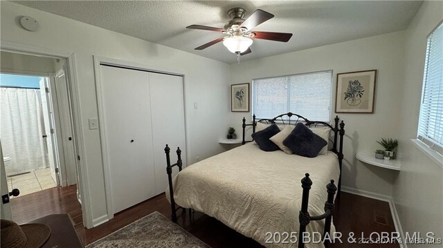 28136 Lyndsey Ln, Rocky Mount, MO 65072 - bedroom featuring a closet and a ceiling fan