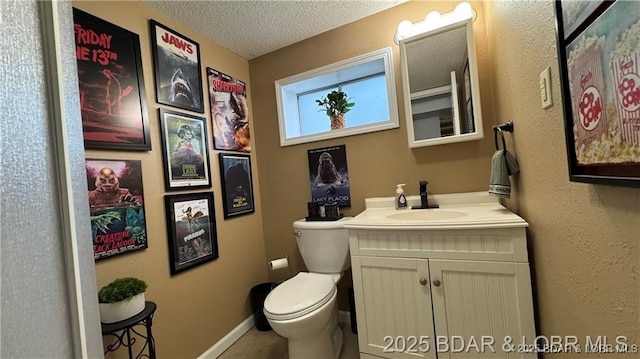 28136 Lyndsey Ln, Rocky Mount, MO 65072 - bathroom featuring vanity and a textured ceiling