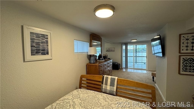 28136 Lyndsey Ln, Rocky Mount, MO 65072 - bedroom featuring carpet floors and a textured wall