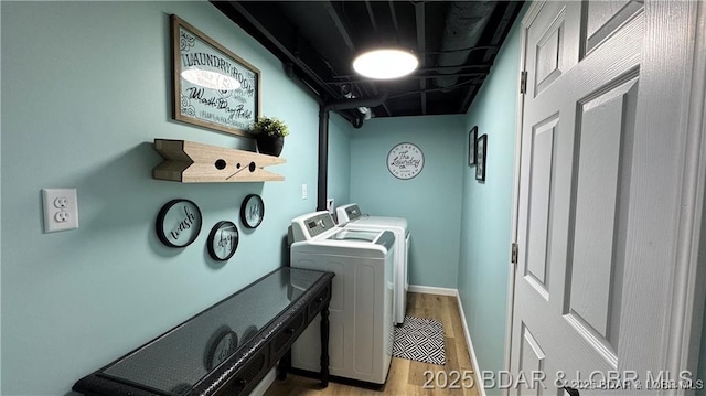 28136 Lyndsey Ln, Rocky Mount, MO 65072 - washroom featuring independent washer and dryer and light wood finished floors