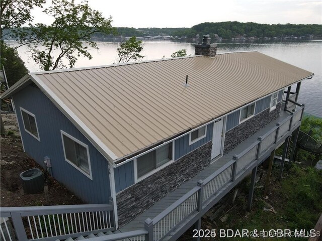 28136 Lyndsey Ln, Rocky Mount, MO 65072 - back of house featuring a metal roof and a water view