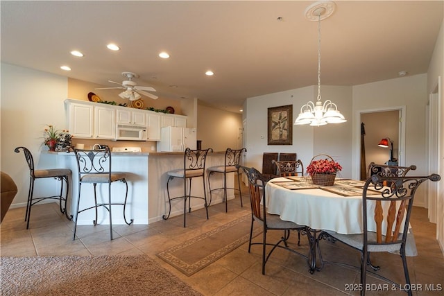 440 Cedar Heights Dr Unit 1C, Camdenton, MO 65020 - dining room with recessed lighting, a chandelier, light tile patterned floors, and ceiling fan