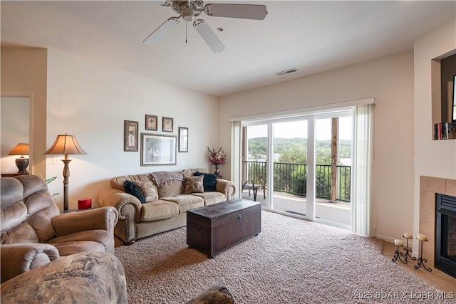 440 Cedar Heights Dr Unit 1C, Camdenton, MO 65020 - living area with a fireplace and a ceiling fan