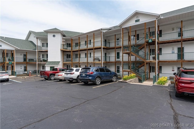 440 Cedar Heights Dr Unit 1C, Camdenton, MO 65020 - view of apartment building / complex with uncovered parking and stairway