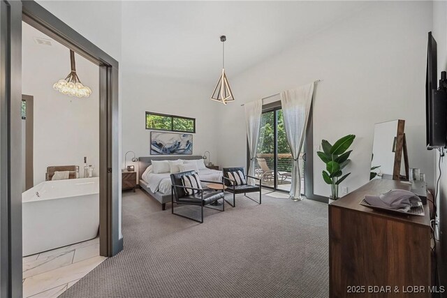 626 Eagle Dr, Four Seasons, MO 65049 - bedroom with access to exterior, carpet flooring, and a chandelier