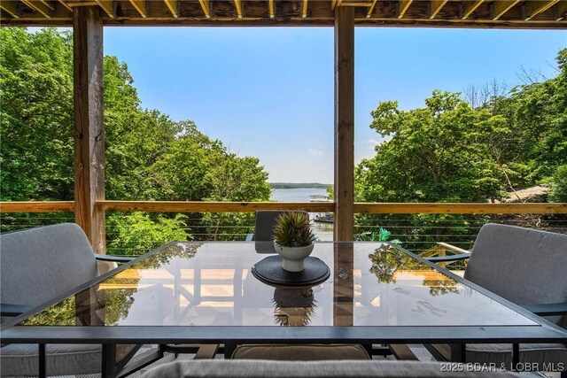 626 Eagle Dr, Four Seasons, MO 65049 - wooden terrace featuring outdoor dining area and a water view