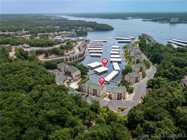34 Bristol Bay Dr Unit 1C, Lake Ozark, MO 65049 - aerial view of a large body of water and a heavily wooded area