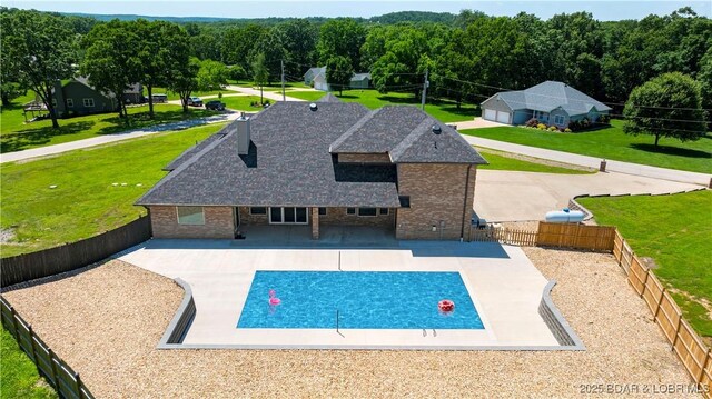82 Fawn Meadows Dr, Linn Creek, MO 65052 - view of swimming pool featuring a fenced backyard and a patio