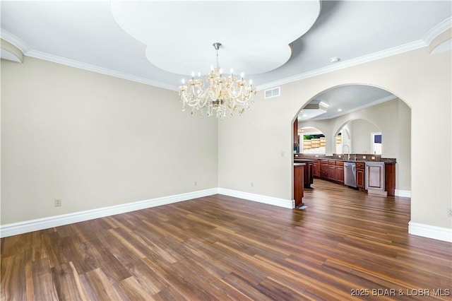 82 Fawn Meadows Dr, Linn Creek, MO 65052 - unfurnished dining area with arched walkways, dark wood-type flooring, crown molding, and a chandelier