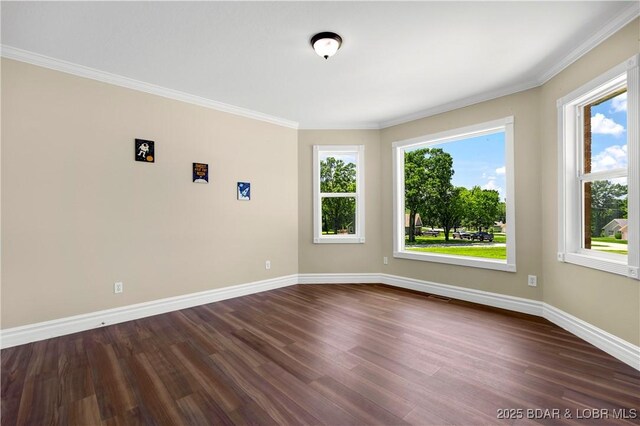 82 Fawn Meadows Dr, Linn Creek, MO 65052 - empty room featuring dark wood-style flooring and crown molding