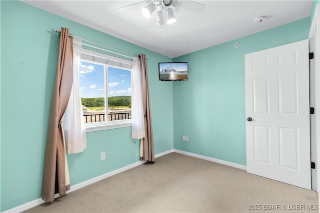 238 Cedar Glen Dr Unit 3F, Camdenton, MO 65020 - empty room with carpet, ceiling fan, and a smoke detector