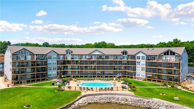 238 Cedar Glen Dr Unit 3F, Camdenton, MO 65020 - view of apartment building / complex featuring a community pool