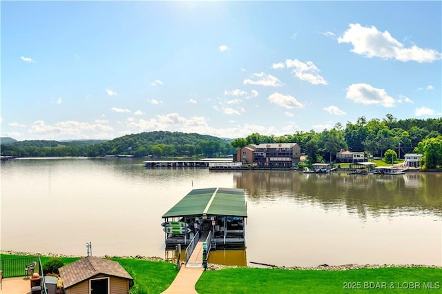 238 Cedar Glen Dr Unit 3F, Camdenton, MO 65020 - dock featuring boat lift and a water view