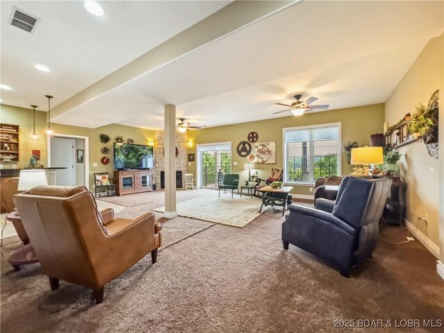 172 Highland Pkwy, Camdenton, MO 65020 - living area with carpet, a ceiling fan, recessed lighting, and a fireplace