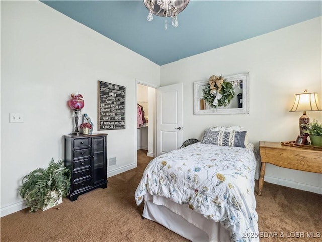 172 Highland Pkwy, Camdenton, MO 65020 - bedroom featuring carpet and a chandelier