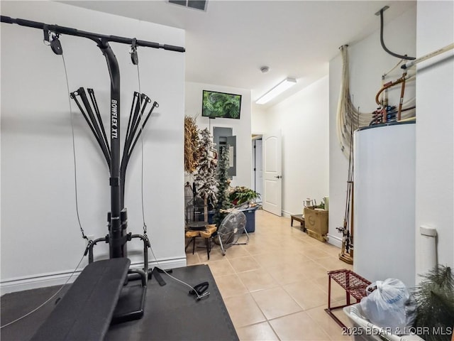 172 Highland Pkwy, Camdenton, MO 65020 - workout area with light tile patterned flooring, water heater, and electric panel