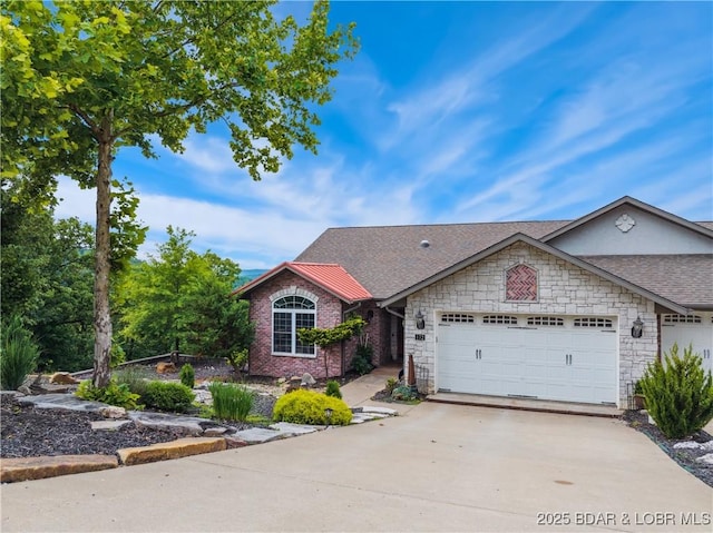 172 Highland Pkwy, Camdenton, MO 65020 - ranch-style home with a garage, concrete driveway, roof with shingles, and stone siding