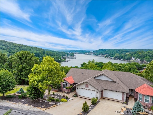 172 Highland Pkwy, Camdenton, MO 65020 - view from above of property featuring a large body of water and a forest