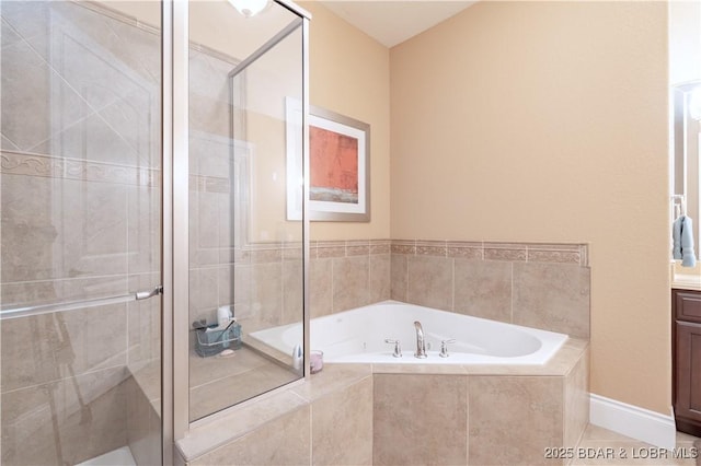 1184 Jeffries Rd Unit 113, Osage Beach, MO 65065 - full bathroom featuring vanity, a bath, and a shower stall