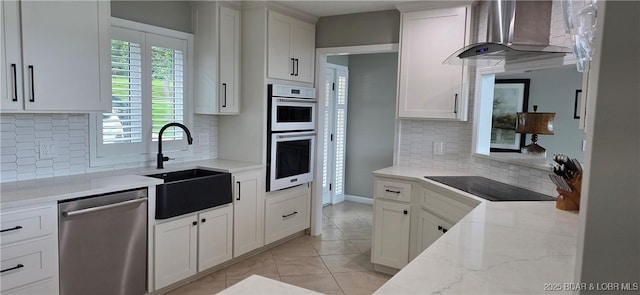 30141 Gentle Cv, Gravois Mills, MO 65037 - kitchen featuring dishwasher, white double oven, wall chimney range hood, backsplash, and black electric cooktop