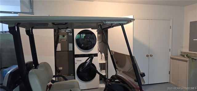 30141 Gentle Cv, Gravois Mills, MO 65037 - washroom featuring stacked washer / drying machine