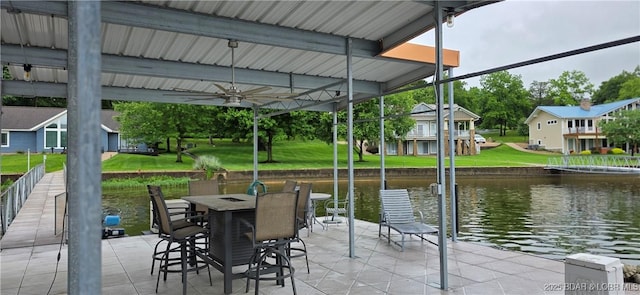 30141 Gentle Cv, Gravois Mills, MO 65037 - dock area with a water view, a yard, and a patio
