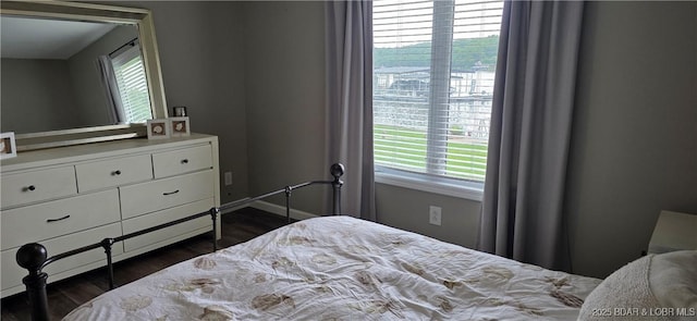 30141 Gentle Cv, Gravois Mills, MO 65037 - bedroom featuring dark wood finished floors and baseboards