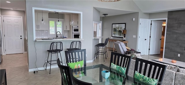 30141 Gentle Cv, Gravois Mills, MO 65037 - dining space featuring light tile patterned floors and recessed lighting