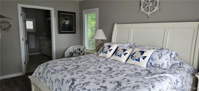 30141 Gentle Cv, Gravois Mills, MO 65037 - bedroom with dark wood-style flooring and ensuite bathroom