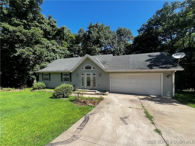 1509 Oak Bend Rd, Sunrise Beach, MO 65079 - ranch-style house with driveway, an attached garage, and a front yard