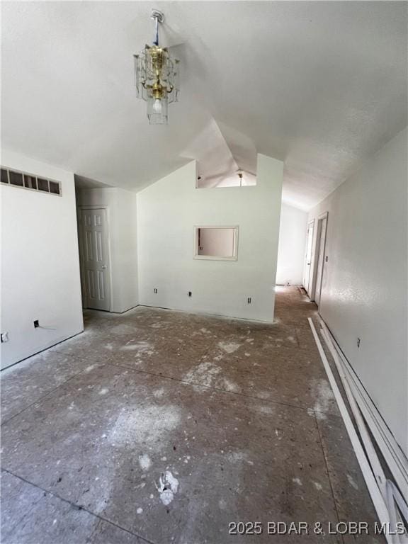 1509 Oak Bend Rd, Sunrise Beach, MO 65079 - unfurnished living room with vaulted ceiling