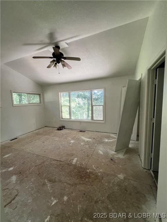 1509 Oak Bend Rd, Sunrise Beach, MO 65079 - empty room featuring vaulted ceiling and ceiling fan