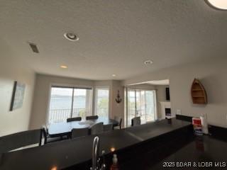 320 Regatta Bay Cir Unit 3B, Lake Ozark, MO 65049 - kitchen featuring recessed lighting and dark countertops