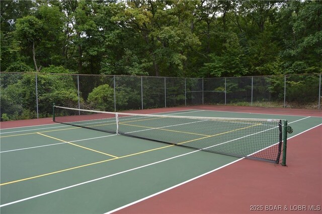 1778 Country Club Dr, Lake Ozark, MO 65049 - view of tennis court featuring community basketball court and a view of trees
