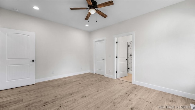 1778 Country Club Dr, Lake Ozark, MO 65049 - unfurnished bedroom featuring wood finished floors, ensuite bath, recessed lighting, and a ceiling fan