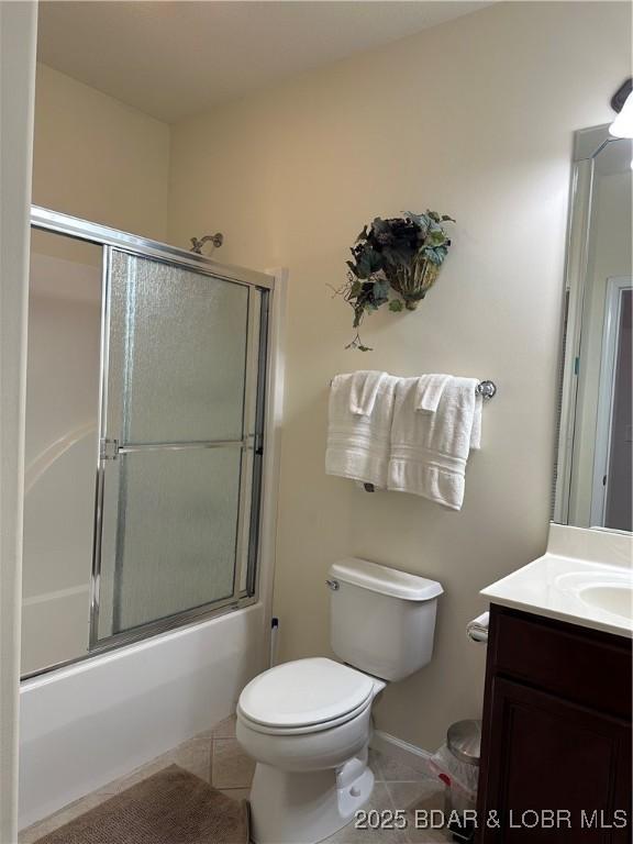 18134 Millstone Cove Rd Unit 212, Gravois Mills, MO 65037 - full bath with vanity, tile patterned flooring, and bath / shower combo with glass door