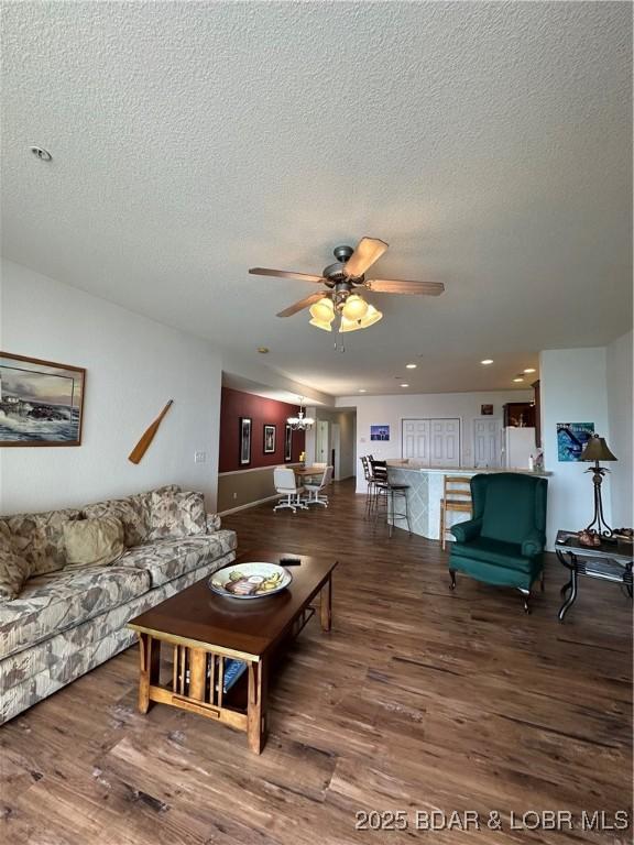 18134 Millstone Cove Rd Unit 212, Gravois Mills, MO 65037 - living room with wood finished floors, a ceiling fan, a textured ceiling, and recessed lighting