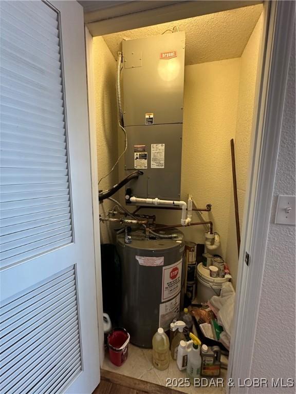 18134 Millstone Cove Rd Unit 212, Gravois Mills, MO 65037 - utilities with water heater and heating unit
