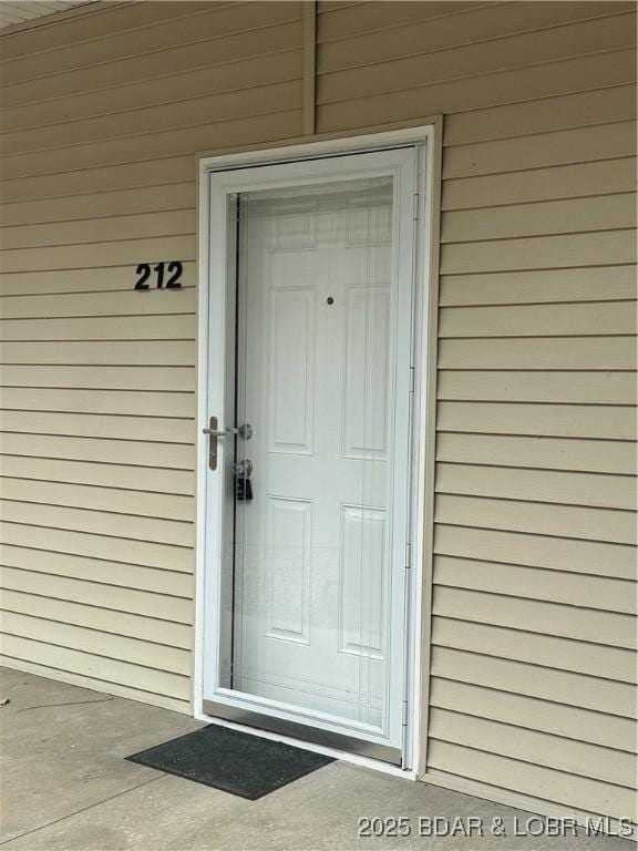 18134 Millstone Cove Rd Unit 212, Gravois Mills, MO 65037 - view of exterior entry