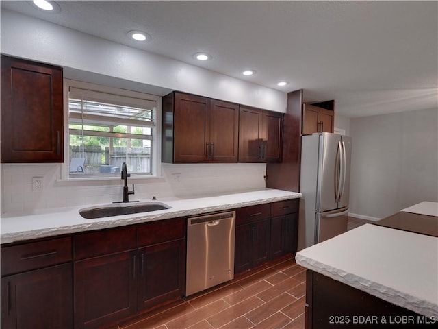 25 Primrose Ln, Camdenton, MO 65020 - kitchen featuring appliances with stainless steel finishes, backsplash, recessed lighting, and dark brown cabinets