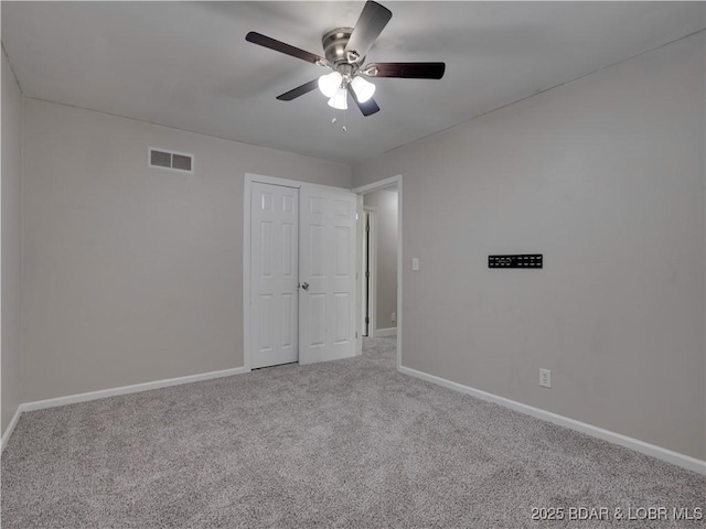 25 Primrose Ln, Camdenton, MO 65020 - unfurnished bedroom featuring carpet floors, a ceiling fan, and a closet