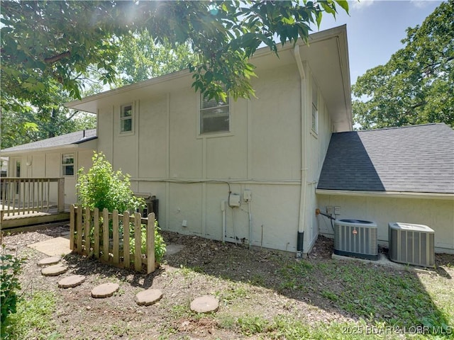 25 Primrose Ln, Camdenton, MO 65020 - view of home's exterior featuring a shingled roof and a wooden deck