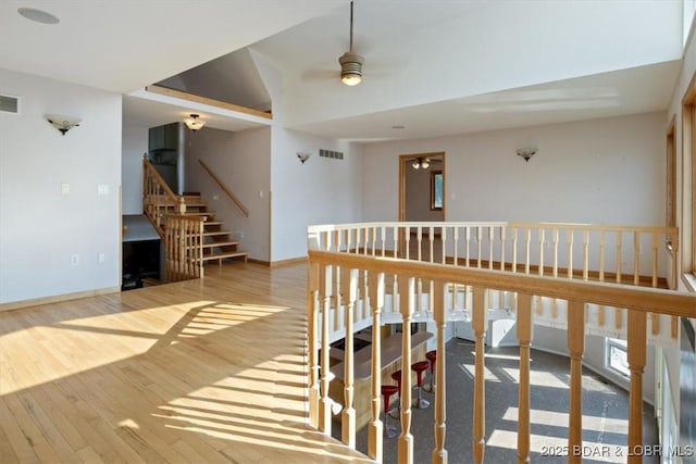 29773 Hemlock Rd, Gravois Mills, MO 65037 - hallway with hardwood / wood-style floors and stairs