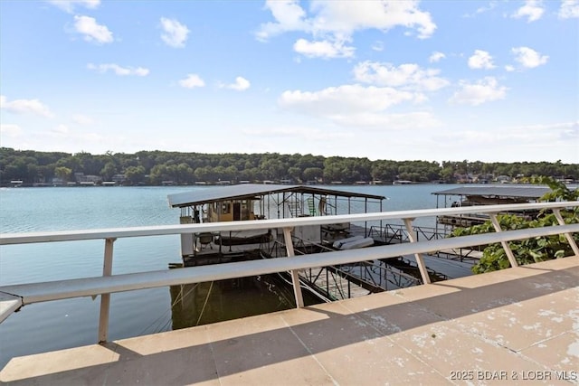 29773 Hemlock Rd, Gravois Mills, MO 65037 - dock area featuring a water view and a wooded view