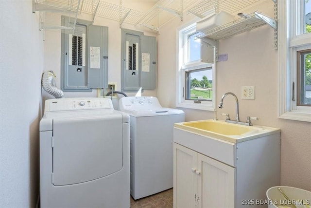 29773 Hemlock Rd, Gravois Mills, MO 65037 - laundry room featuring electric panel, independent washer and dryer, and cabinet space